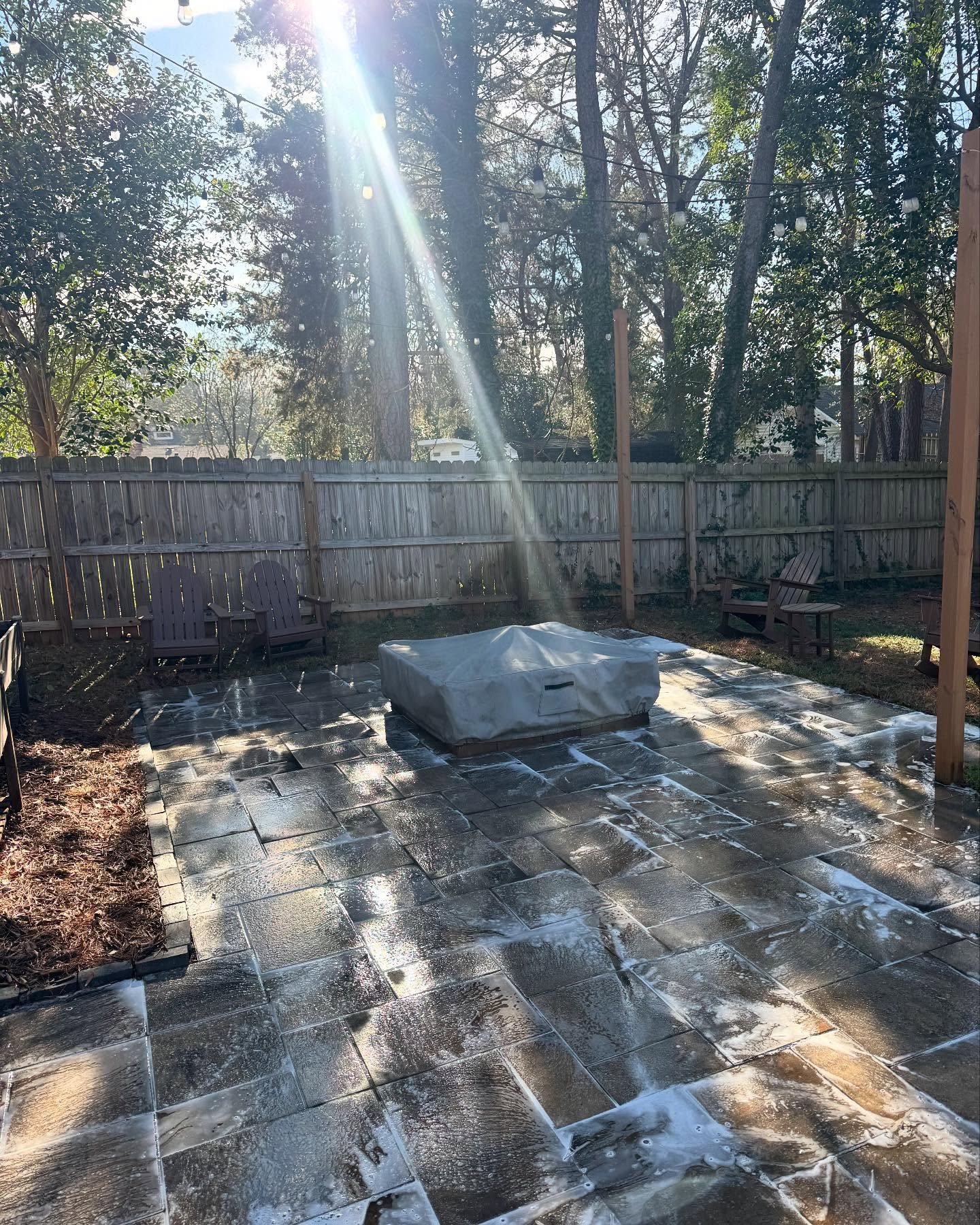 Clean concrete driveway in the sun after pressure washing in Lincolnton NC